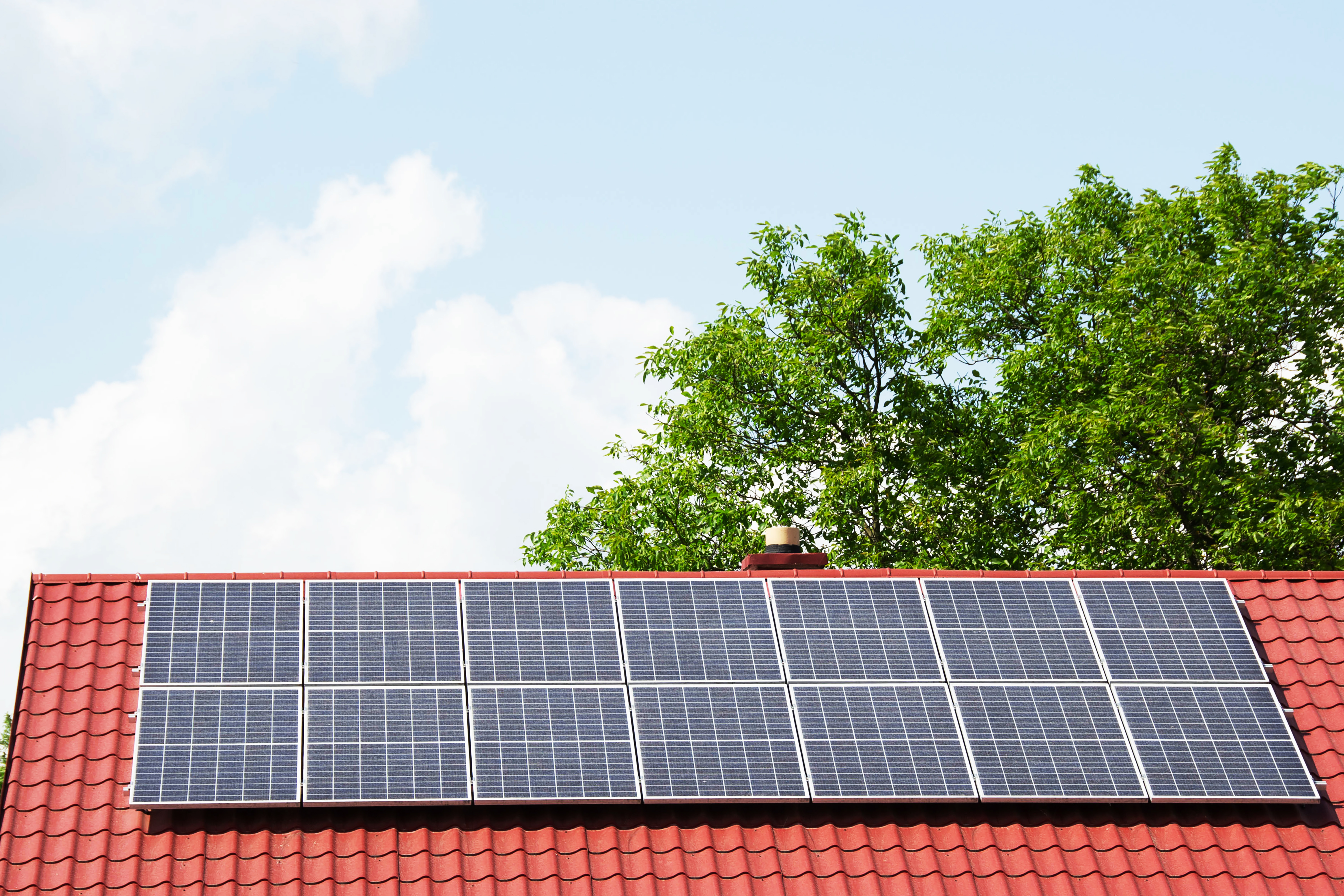 Roofers installing solar-ready roofing